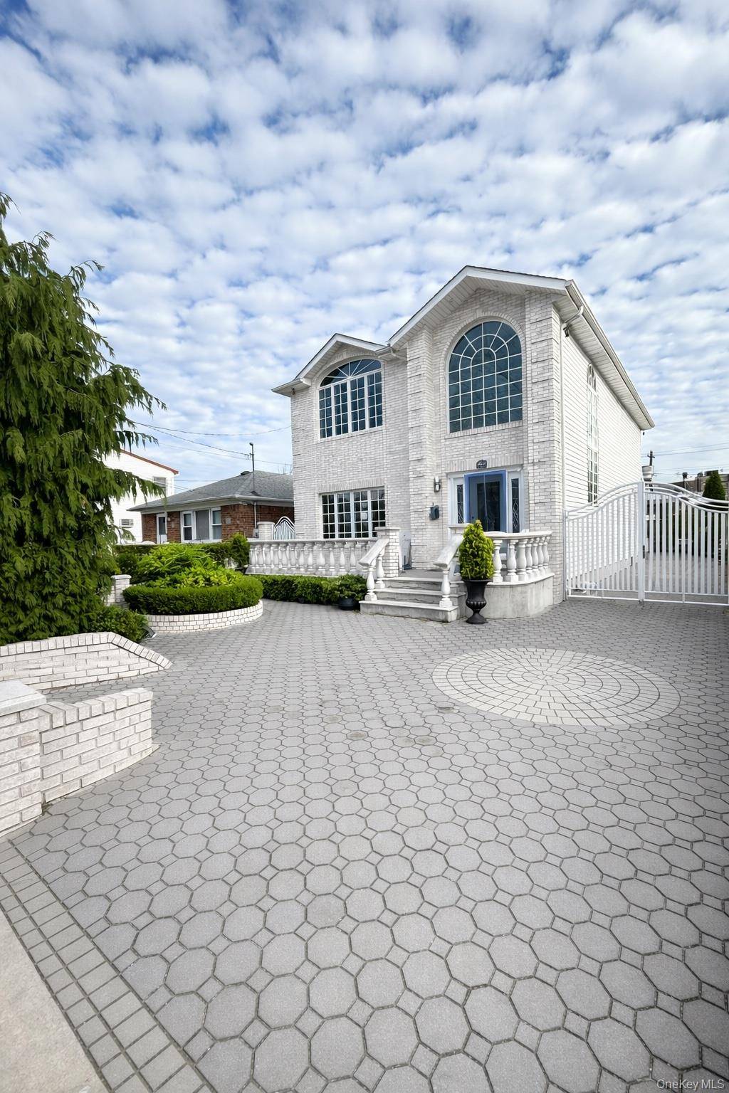 Beautiful Custom Home in Prime Howard Beach Location Welcome to 158 23 92nd Street a bright and modern custom home offering comfort, style, and convenience.