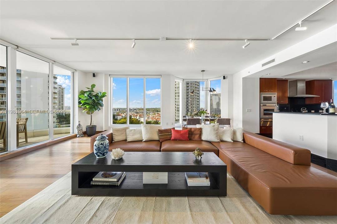 Magnificent corner residence in Bella Mare at Williams Island, masterfully designed by Haute Design Group and offering the largest primary suite layout in the building.