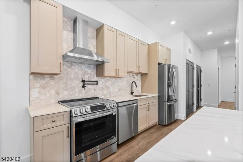 Introducing an exceptional new condominium residence offering the perfect blend of modern design, natural light, and boutique living in the heart of Newark.
