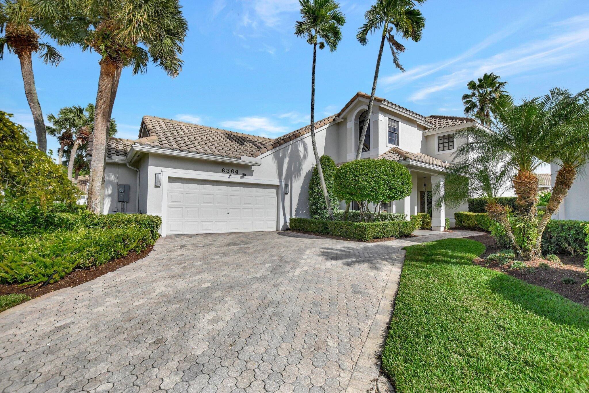 A stunning home in the heart of Boca Raton, located within the prestigious Broken Sound Country Club and near top rated schools.
