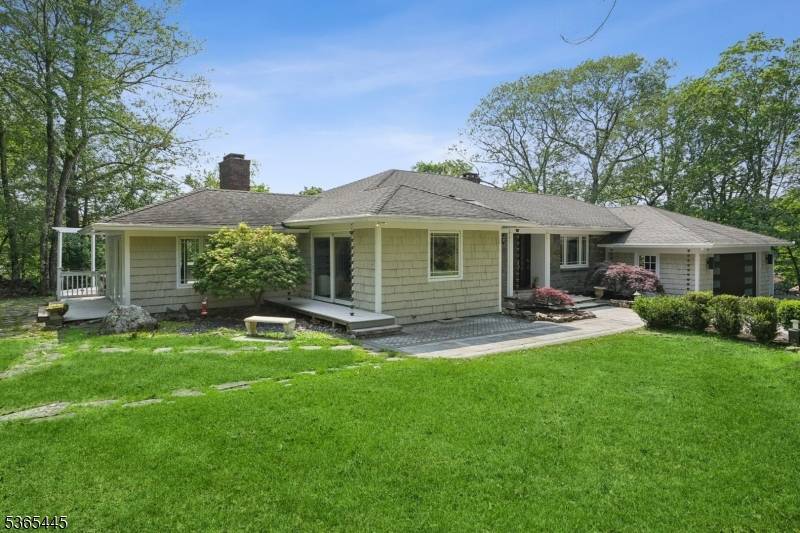 Nestled on a prime lot in prestigious Smoke Rise, this stunning custom ranch offers the perfect blend of privacy, charm, and lifestyle.