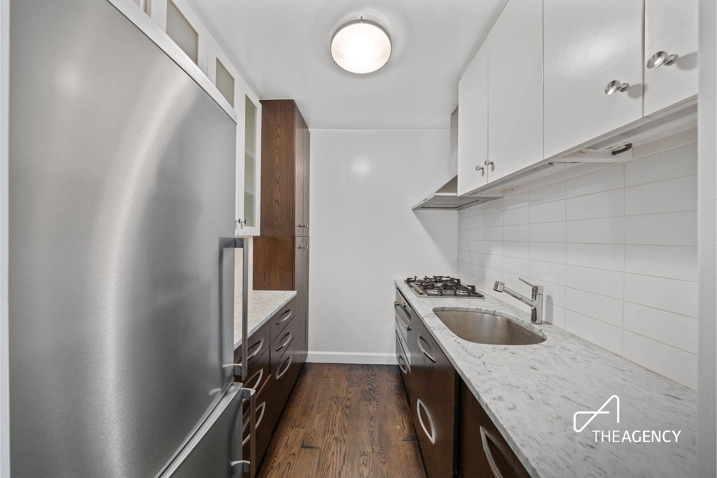 Welcome home to this stunning apartment overlooking the garden on the 2nd floor, that boasts meticulous attention to detail.