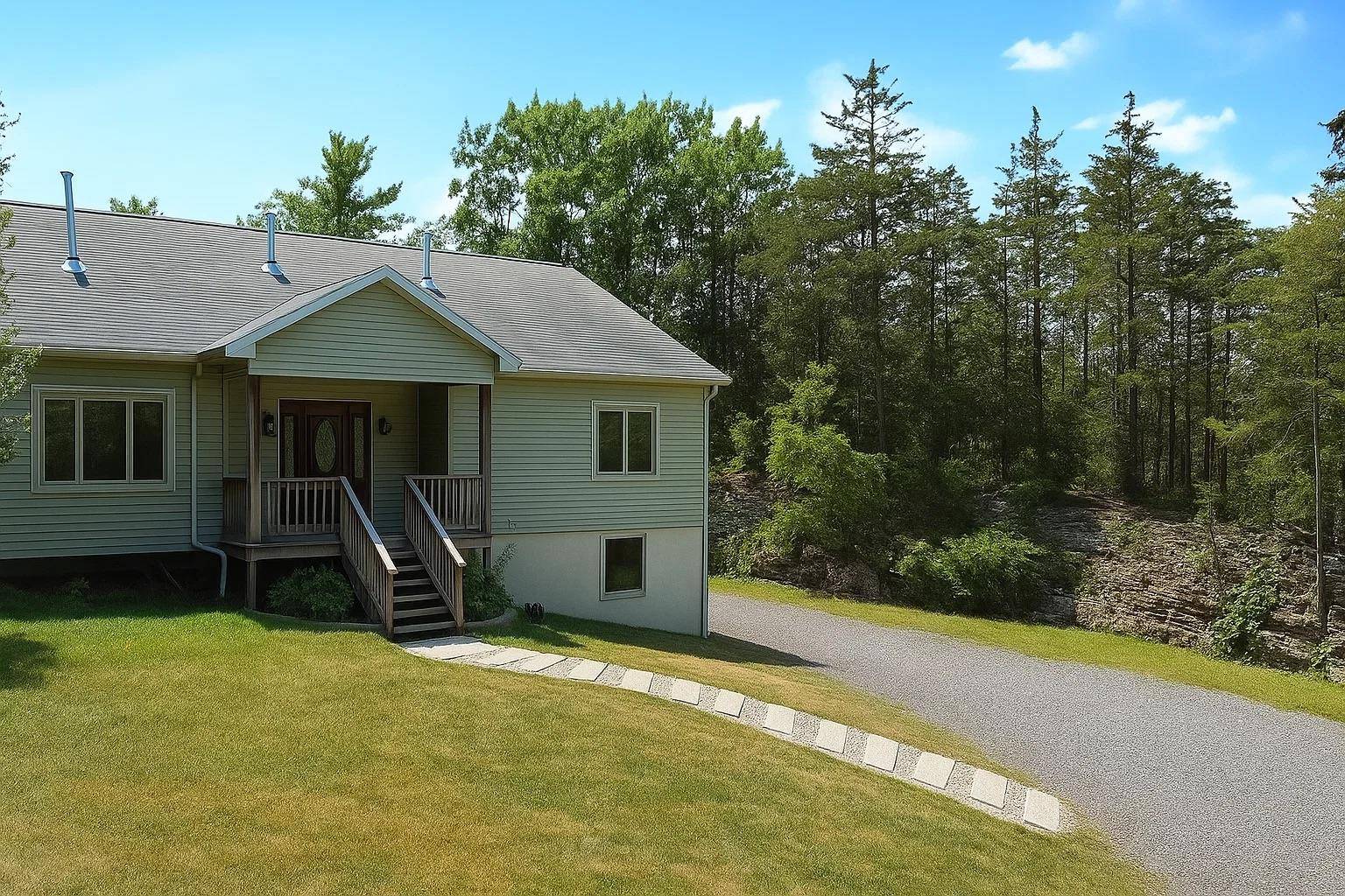 Private 6 acre Contemporary at Rock Ridge Estate Located on a secluded road, this beautifully updated home offers the perfect blend of modern comfort, nature, and serene country living.