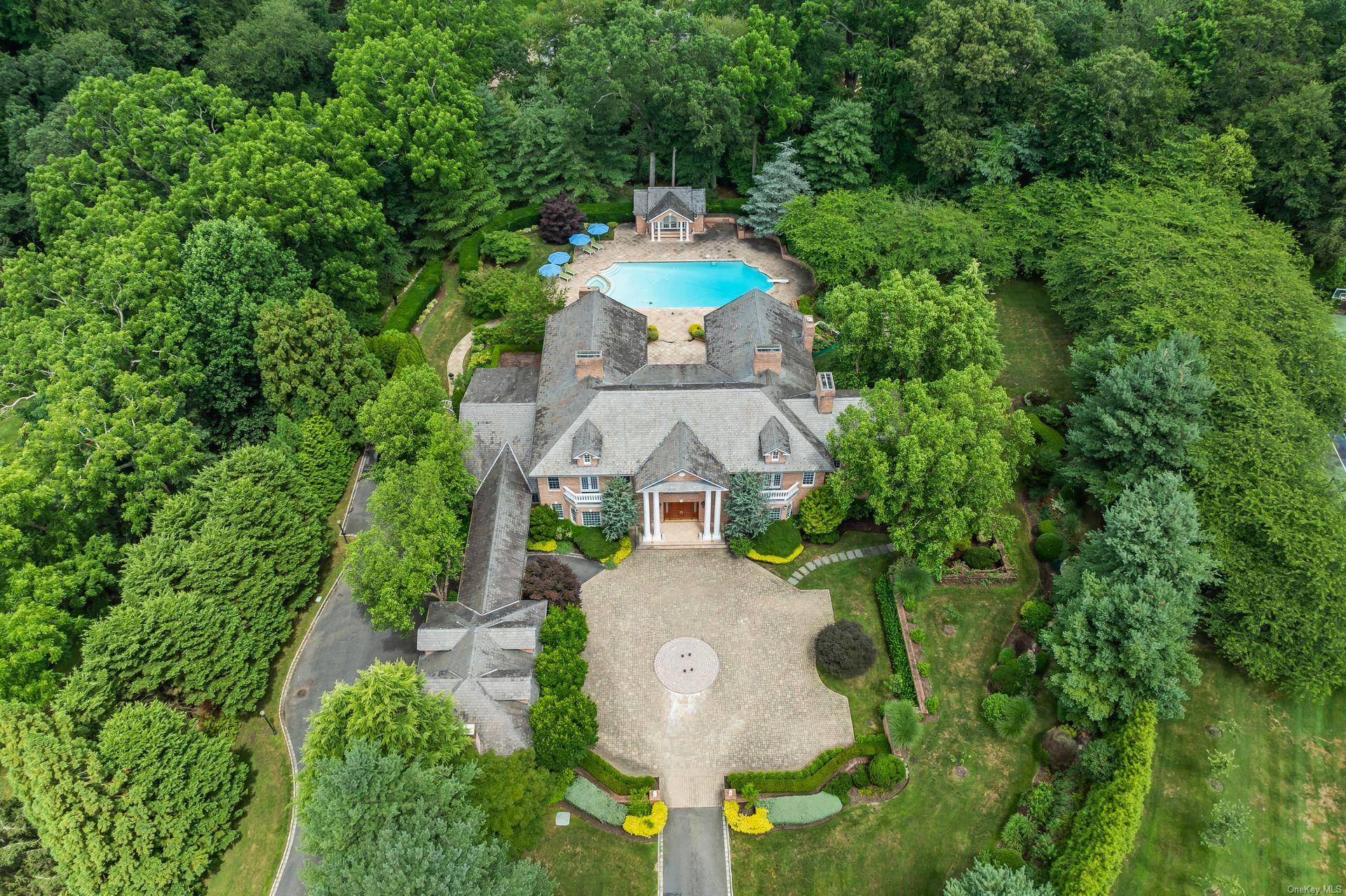 Nestled on 5. 33 acres of pristine landscape, this stunning 2003 estate embodies sophisticated living at its finest.