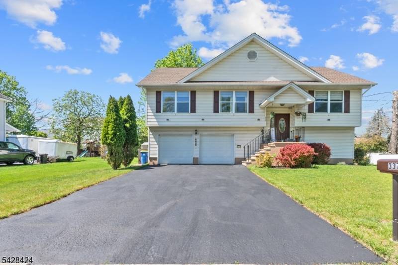 Welcome home to this spacious bi level home, built in 1999 located in a quiet residential neighborhood.