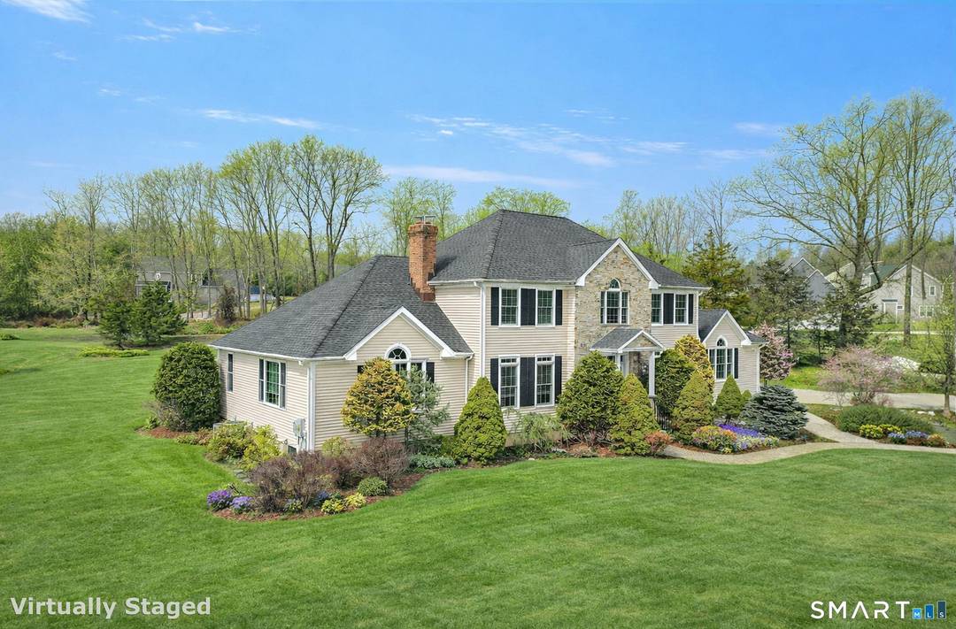 Located on a desirable cul de sac in one of Monroe's most sought after neighborhoods, this exceptional Colonial is set on two beautifully usable acres and offers an impressive blend ...