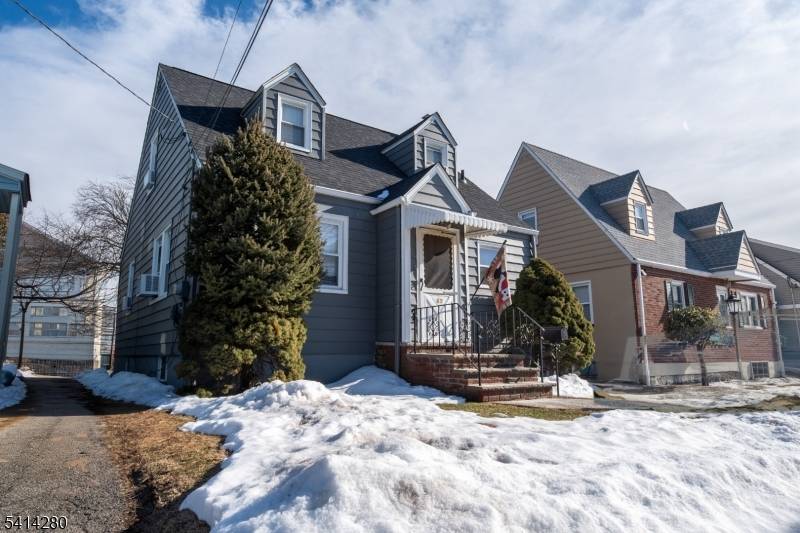 Spacious and updated three bedroom, two and a half bathroom single family home at Penobscot St in Clifton, NJ.
