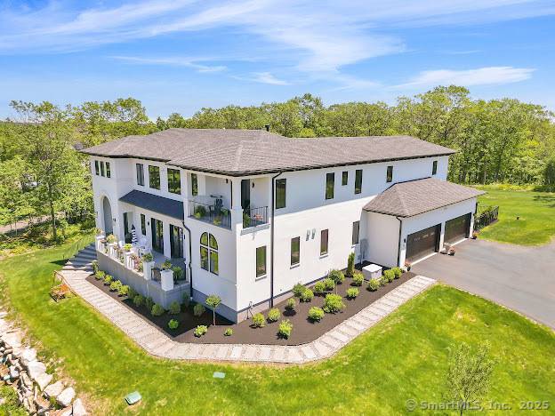 Breathtaking Mediterranean Inspired Masterpiece with Panoramic Skyline Views Perched atop a stunning mountaintop setting with commanding views of the capital and surrounding skyline, this extraordinary estate defines true luxury living.