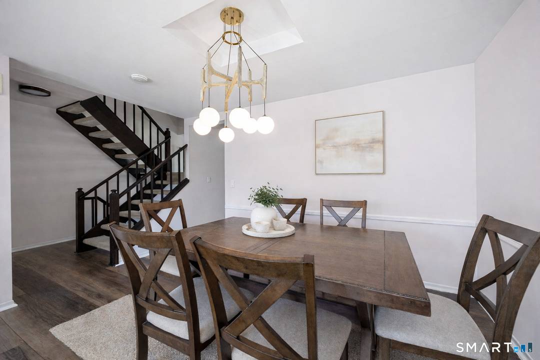 Welcome to 237 Strawberry Hill Ave 27, a beautifully updated 3 bedroom, 2.