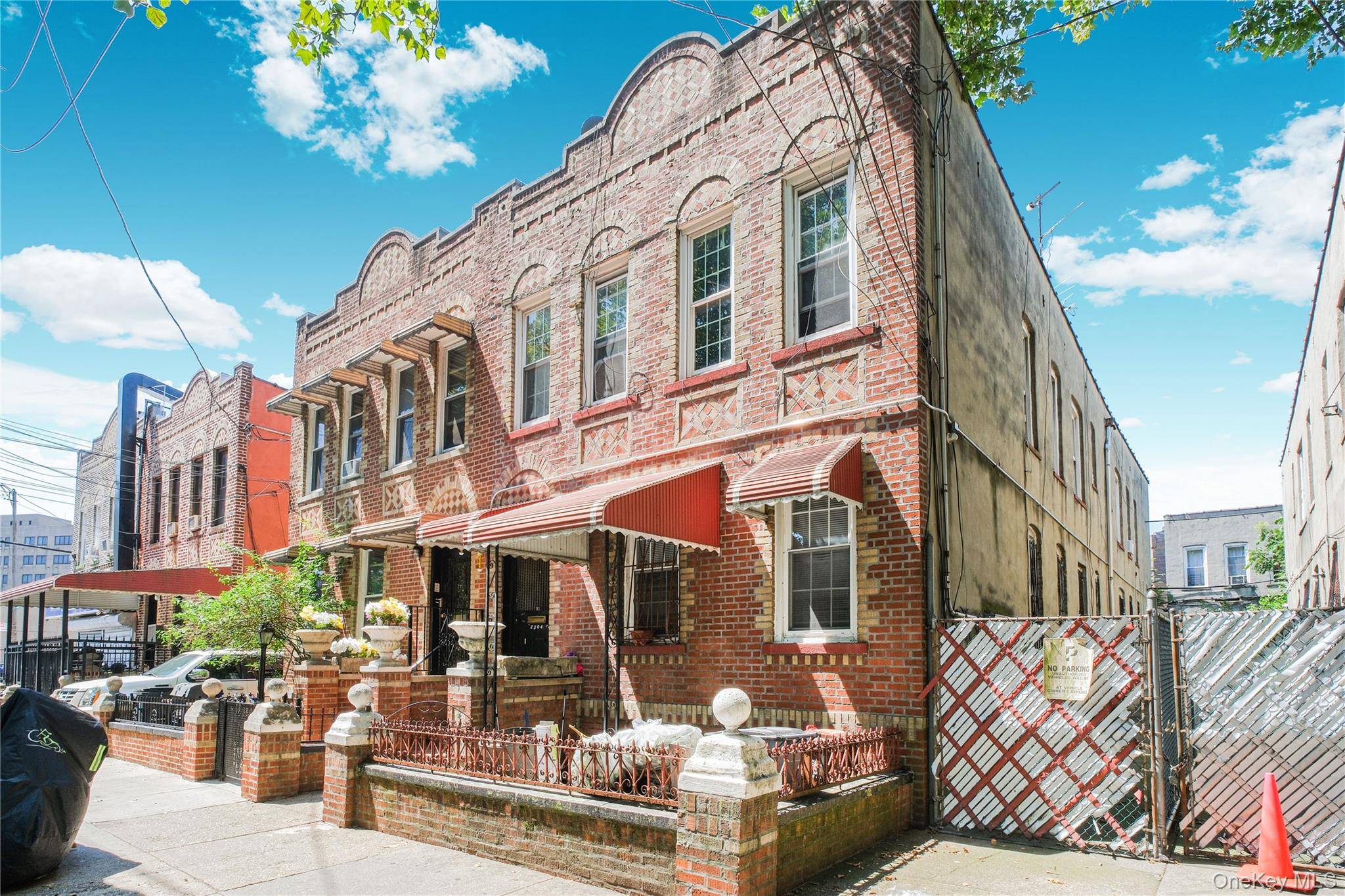 This elegant four family brick residence offers 3, 902 sq.