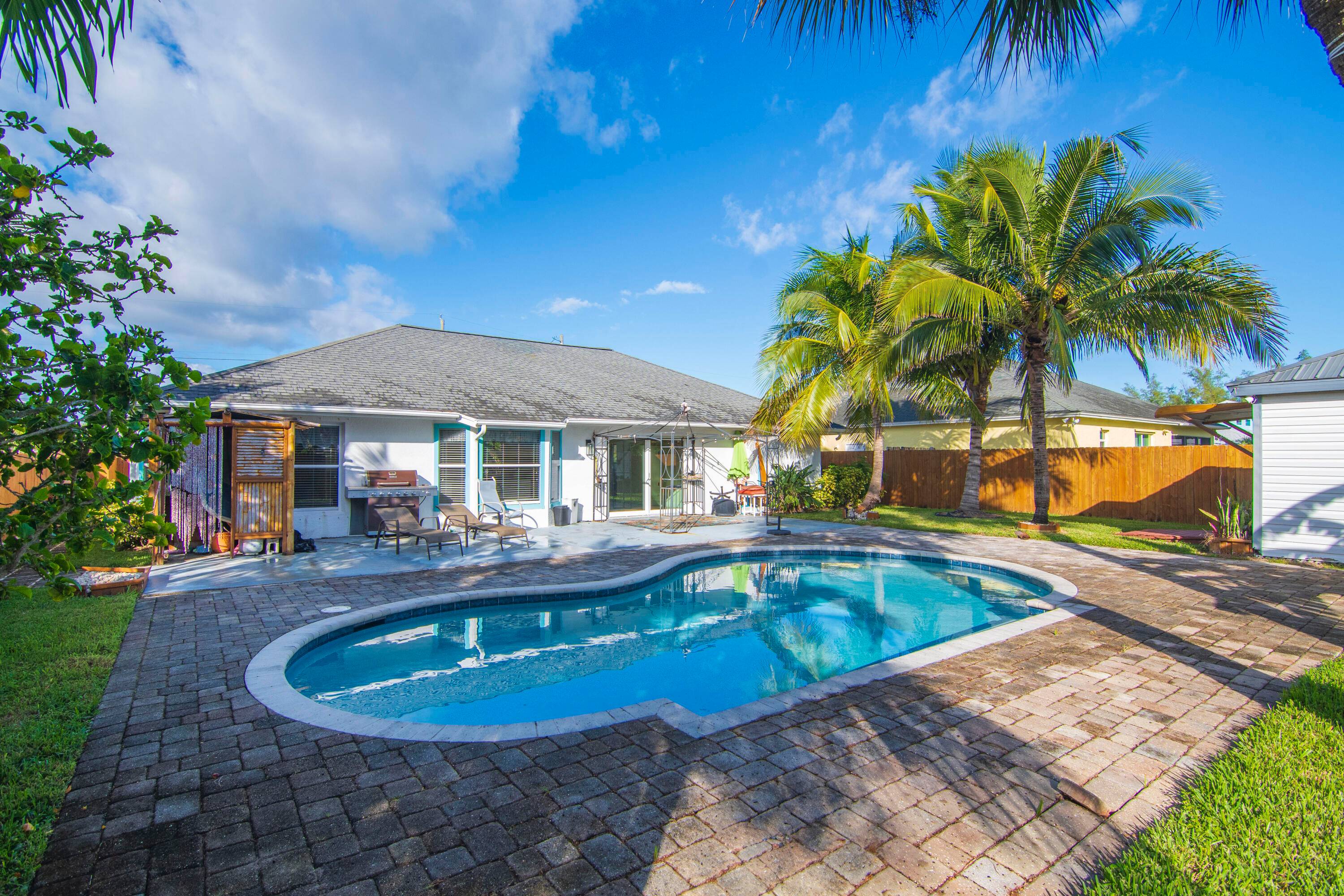 WELCOME HOME to this lovely 3 bedroom, 2 bath pool home is perfectly located just steps from Downtown Fort Pierce, A1A, and the beautiful Fort Pierce Beach.