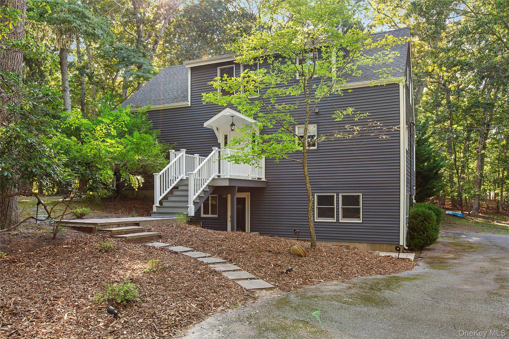Enjoy a beautifully updated home in the desirable Harbor Lights beach community.