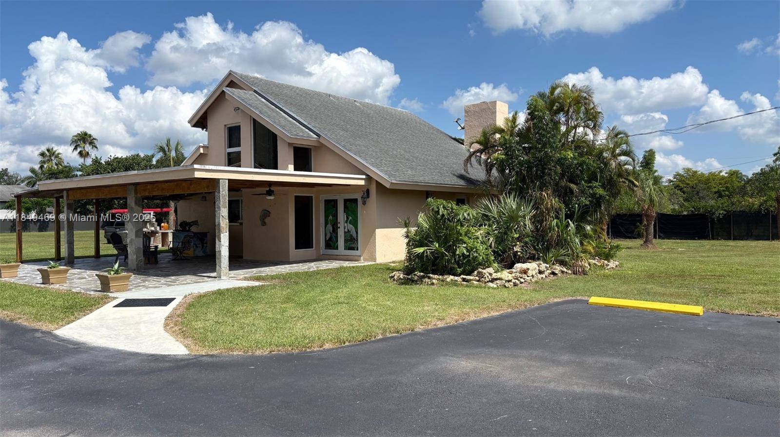 Spacious 3 bed, 2 bath home with a 4 car garage, sits on a 1.