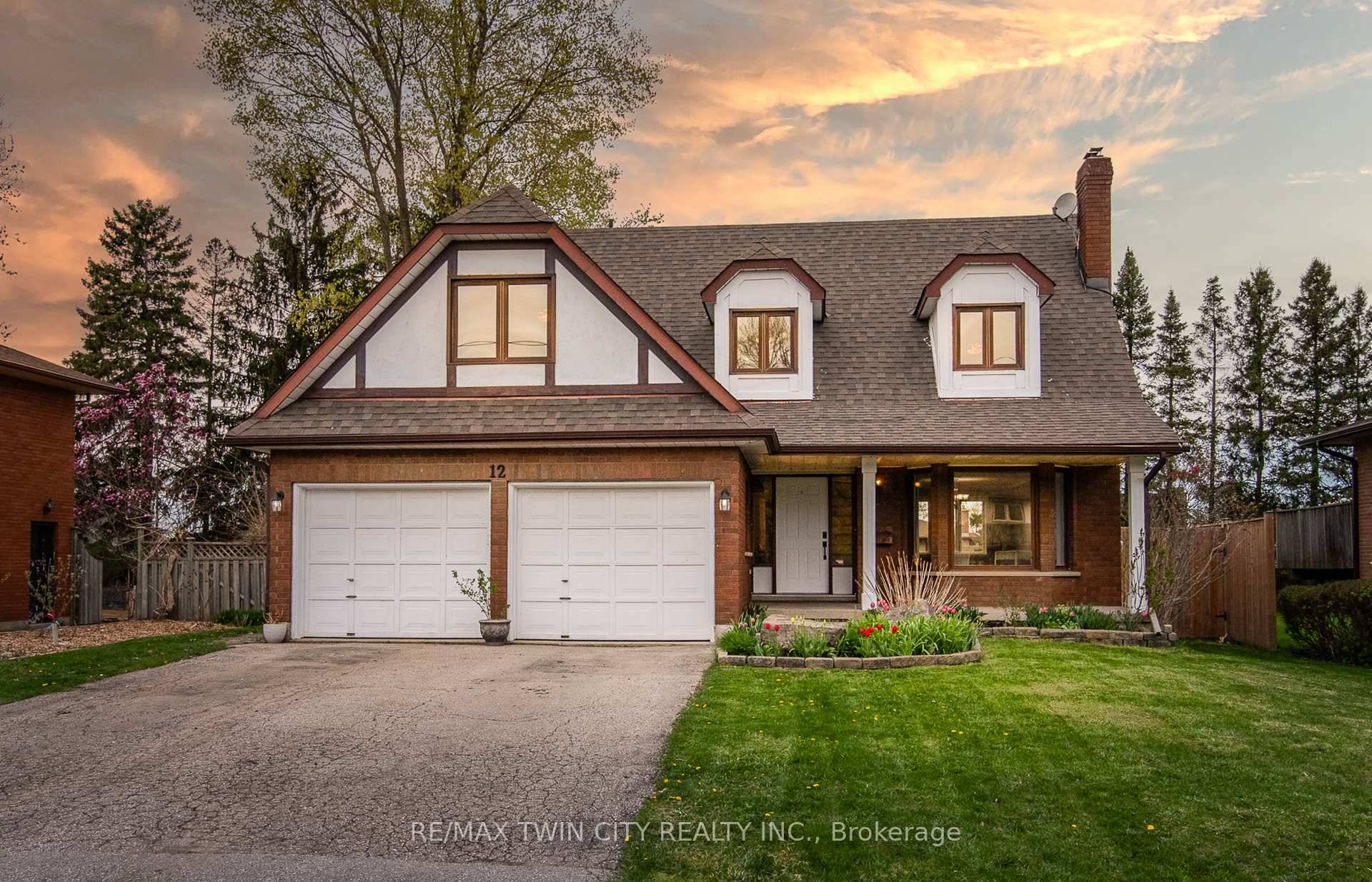 Charming Custom Built Home on Nearly 1 4 Acre Lot Welcome to 12 Sunrise Dr, a spacious and sun drenched custom built home nestled in one of Kitchener's most desirable ...