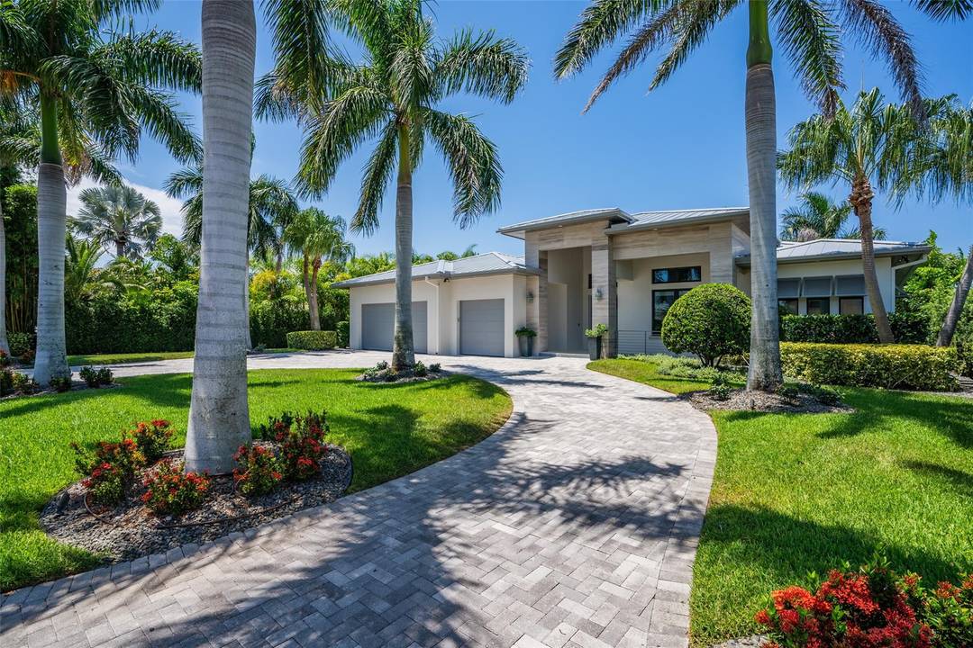 Chance of a lifetime to own this luxury waterfront estate on Coronado Island in the prestigious Venezia boating community of New Smyrna Beach, minutes from the beach.