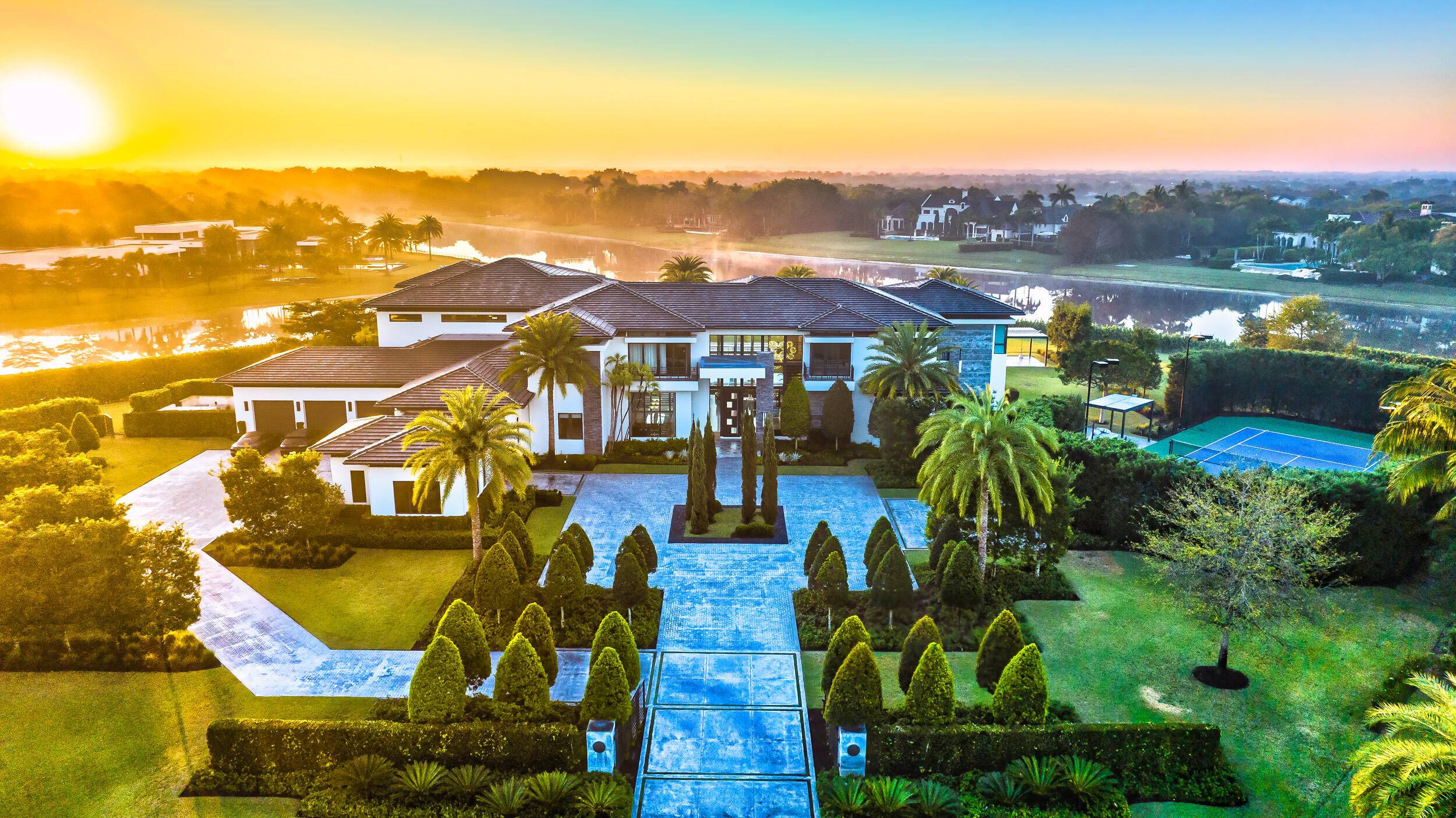 This seven bedroom, nine full and two half bath lakefront masterpiece is situated on a supremely private 2.