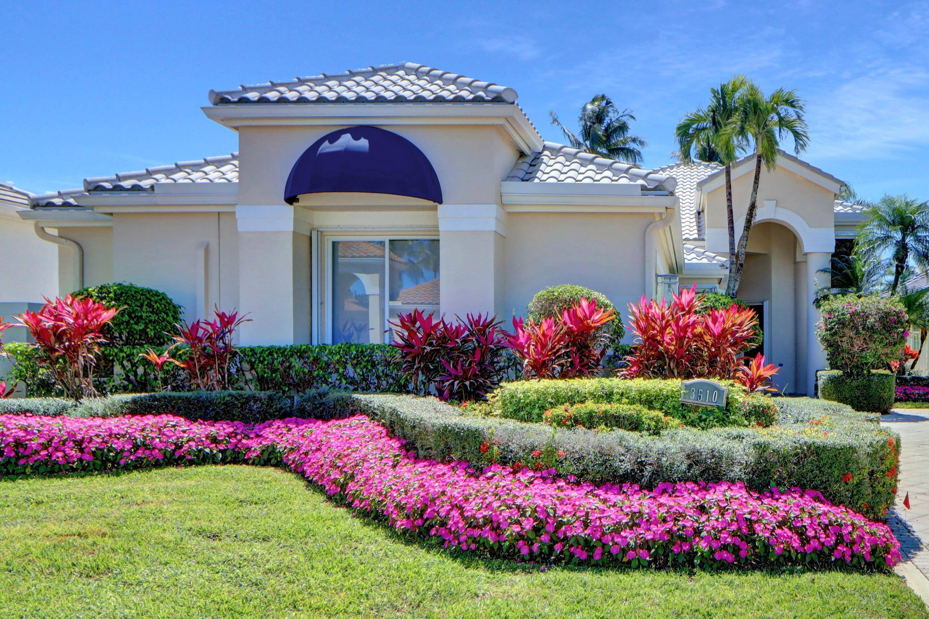 Tranquil lake views and sunlight fill this one story home of 3 bedrooms plus an office open bright featuring volume ceilings with LED high hat lighting ; white neutral tile ...