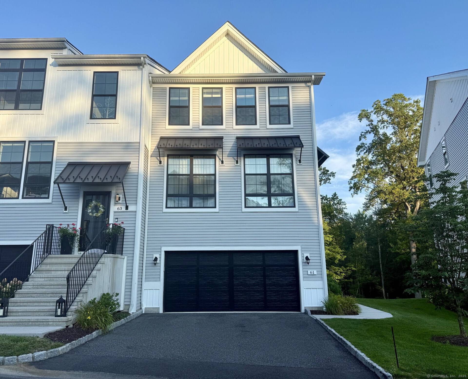 Exceptional 4BR, 3. 5BA end unit Toll Brothers townhome with 125K in upgrades in sought after Rivington.
