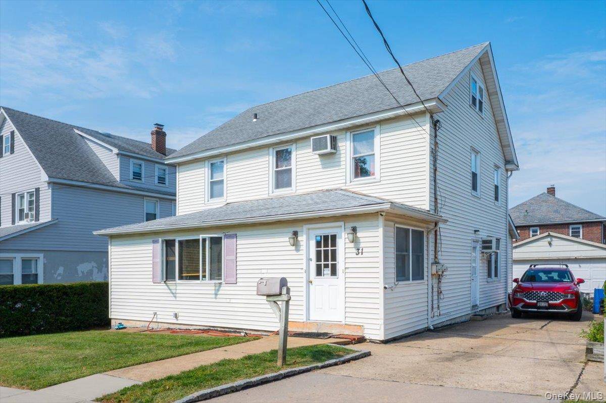 Exceptional opportunity to own a legal two family home in one of Glen Cove s most convenient locations !