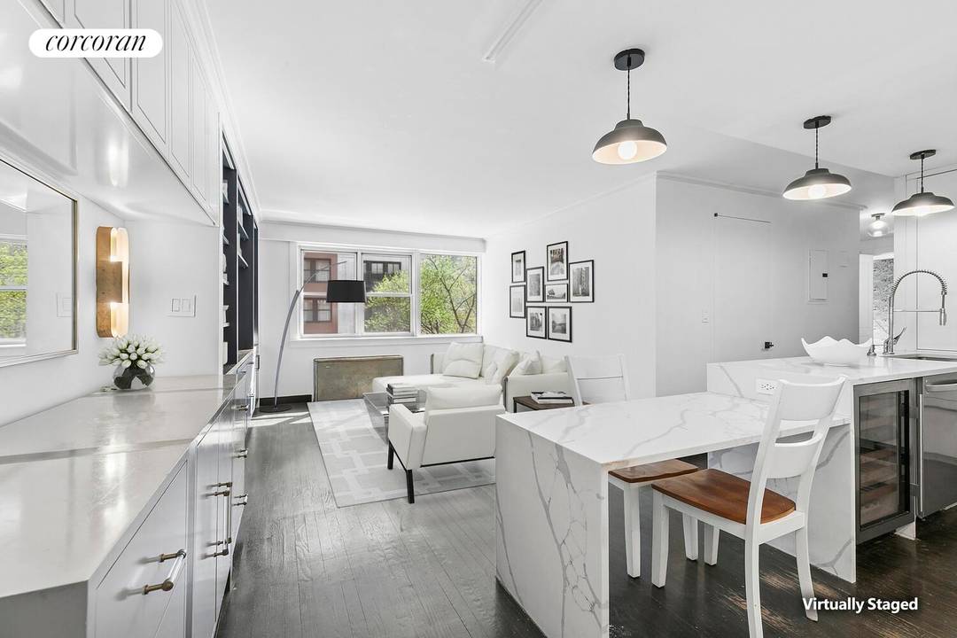 Welcome to Residence 3F at 77 East 12th Street, a meticulously renovated two bedroom, one bathroom home located in the heart of Greenwich Village, New York City.