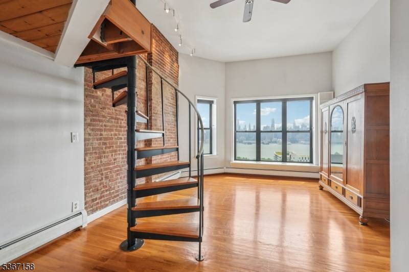 A Must See Gem ! This ultra chic studio apartment with a lofted sleeping area offers breathtaking, panoramic skyline views that will leave you speechless.