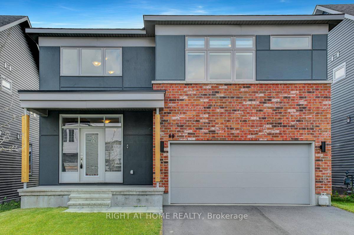 5 Bedrooms 5 Bathrooms 11' Ceilings Living Room 18' Ceiling Grand Foyer The Oliver Elevation C by EQ Homes.