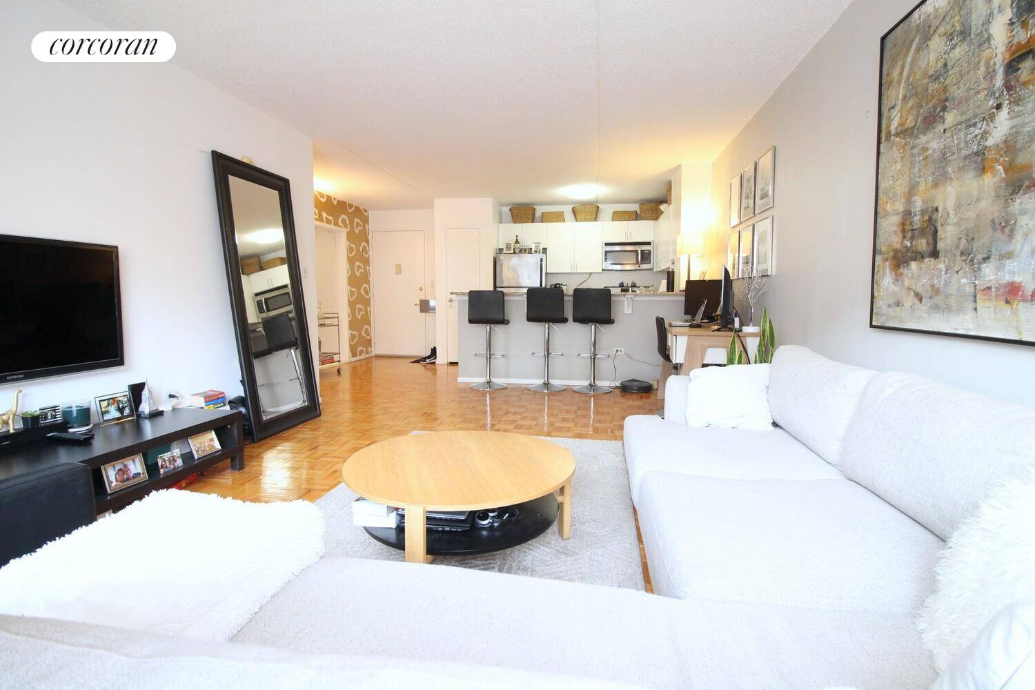 Chelsea ! This home is a large true 1 bedroom apartment situated in a 24 Hour attended lobby building with laundry, fitness center, and sundeck.