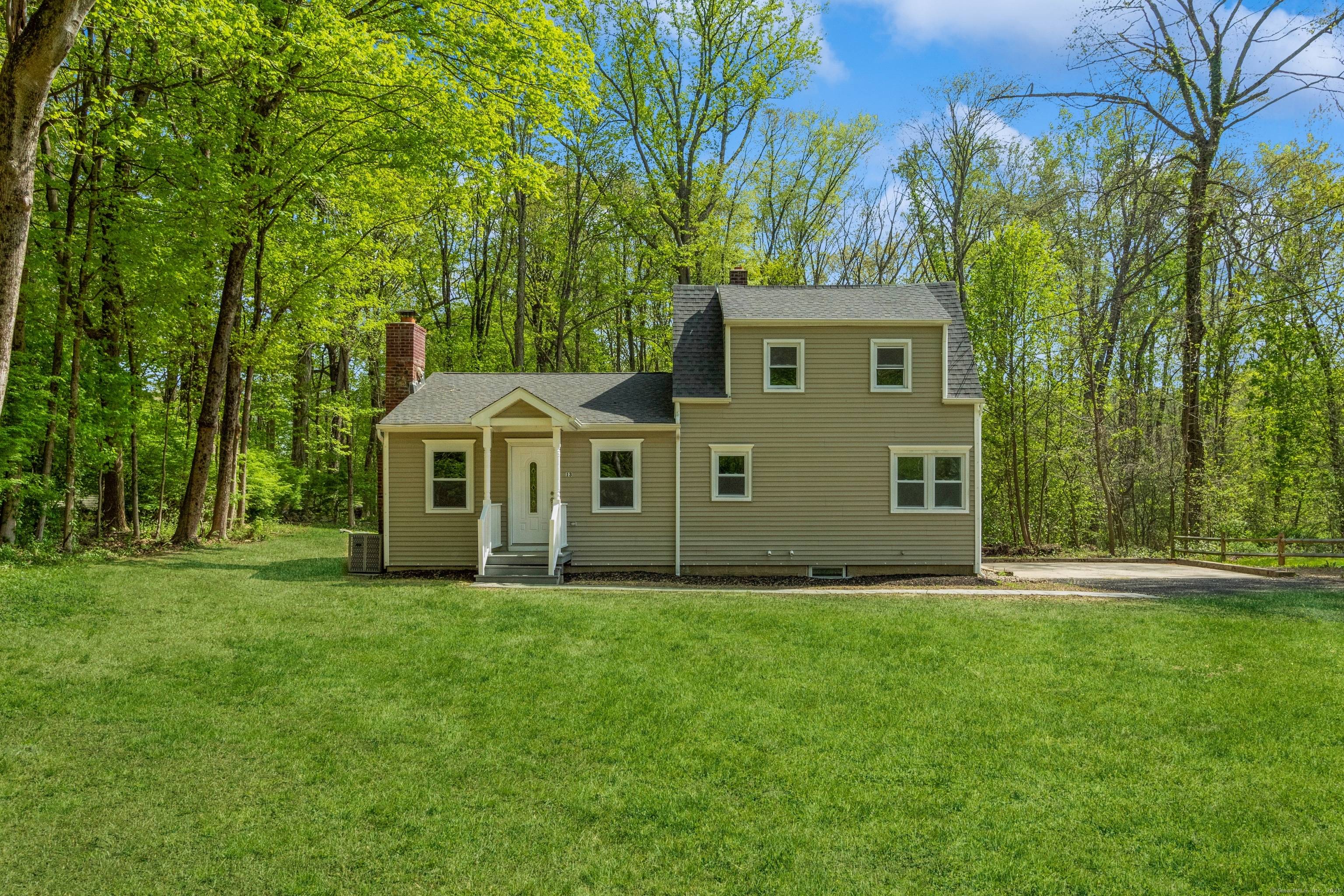 Charming Expanded Cape nestled in a Quiet neighborhood.
