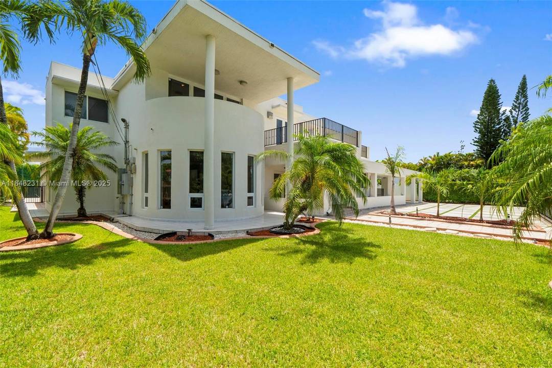 Modern pool home with hurricane protection custom build with concrete and steel roof, impact windows and doors open layout 22 foot ceiling in the living room with half bathroom, large ...