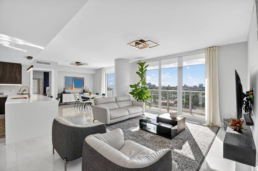 Contemporary waterfront residence on the Middle River with unobstructed sunset and skyline views.