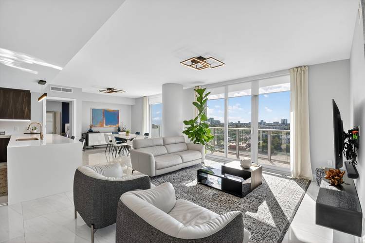 Contemporary waterfront residence on the Middle River with unobstructed sunset and skyline views.