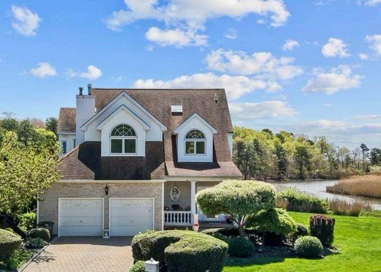 A rare opportunity to own the finest slice of waterfront paradise in Water Pointe at Oakdale Shores where coastal living meets nature s untouched beauty !