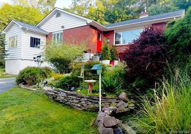 This beautiful three bedroom ranch style home is nestled in a serene community, offering a tranquil retreat with stunning waterfalls and a clubhouse for residents to enjoy.