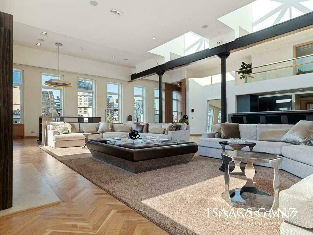 A rare opportunity to own one of downtown Manhattan s largest loft penthouses.