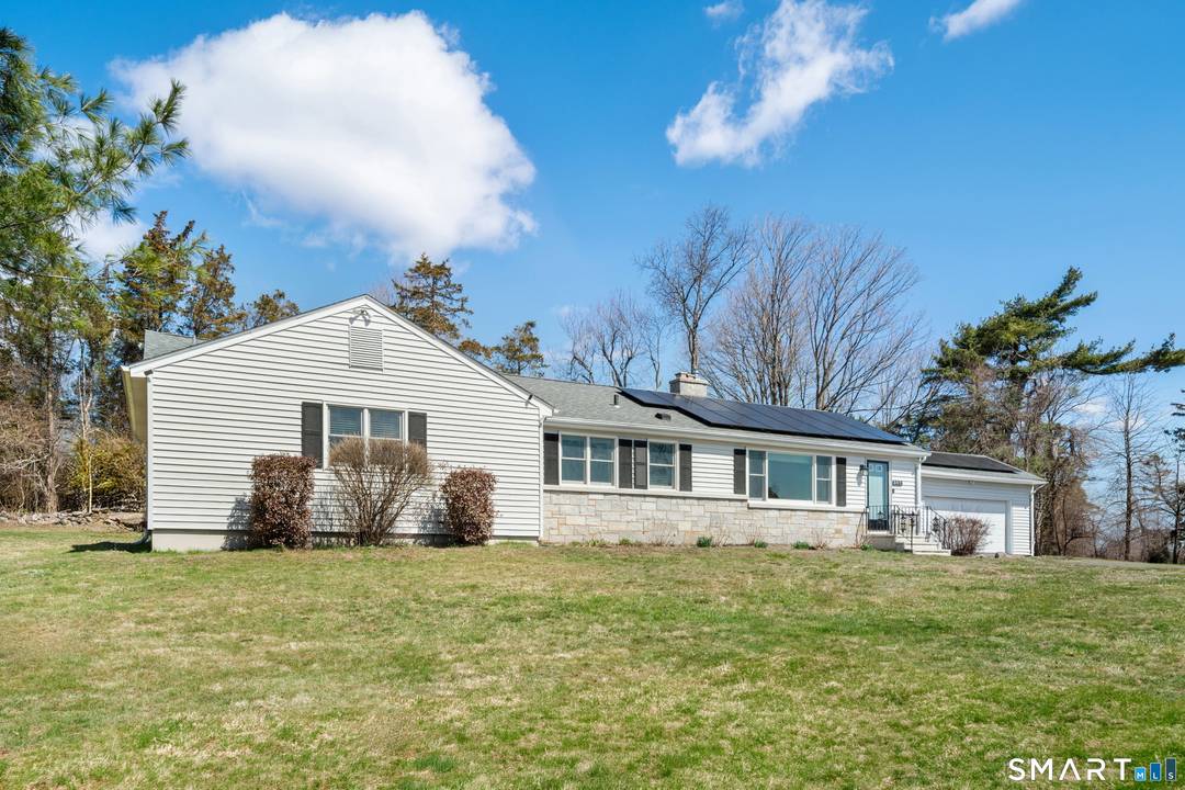 Set on 2. 5 level acres just ten minutes from the Merritt Parkway, this sunny Bethany ranch is ready for new owners !