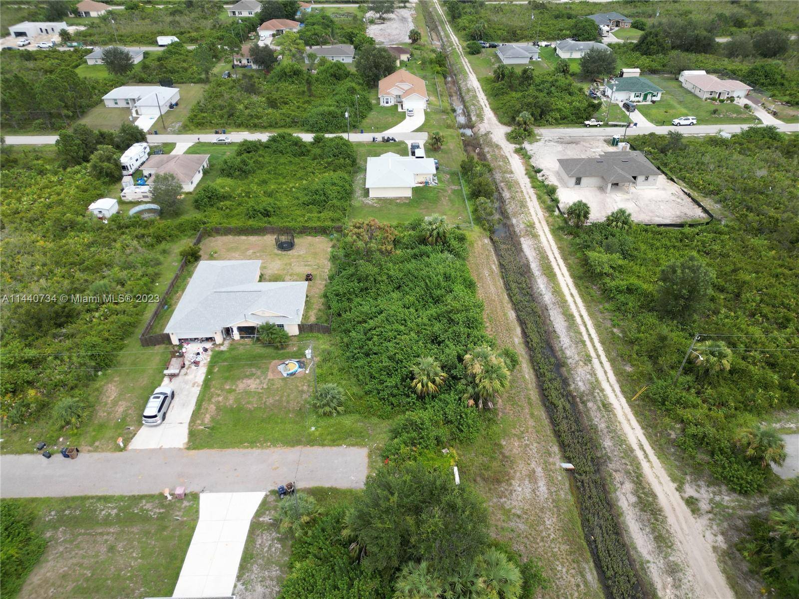 Here is a fabulous corner lot next to a wide canal.