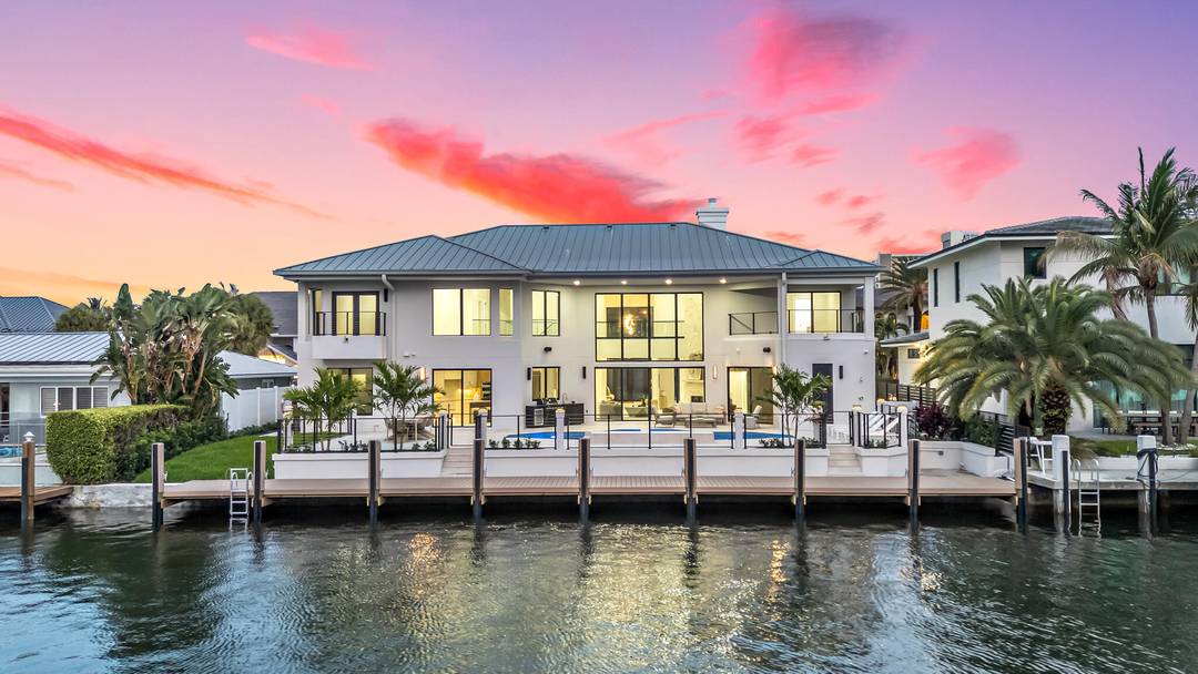Welcome to one of the most sought after waterfront homes for sale in South Florida located in Lighthouse Point's prestigious Venetian Isles.
