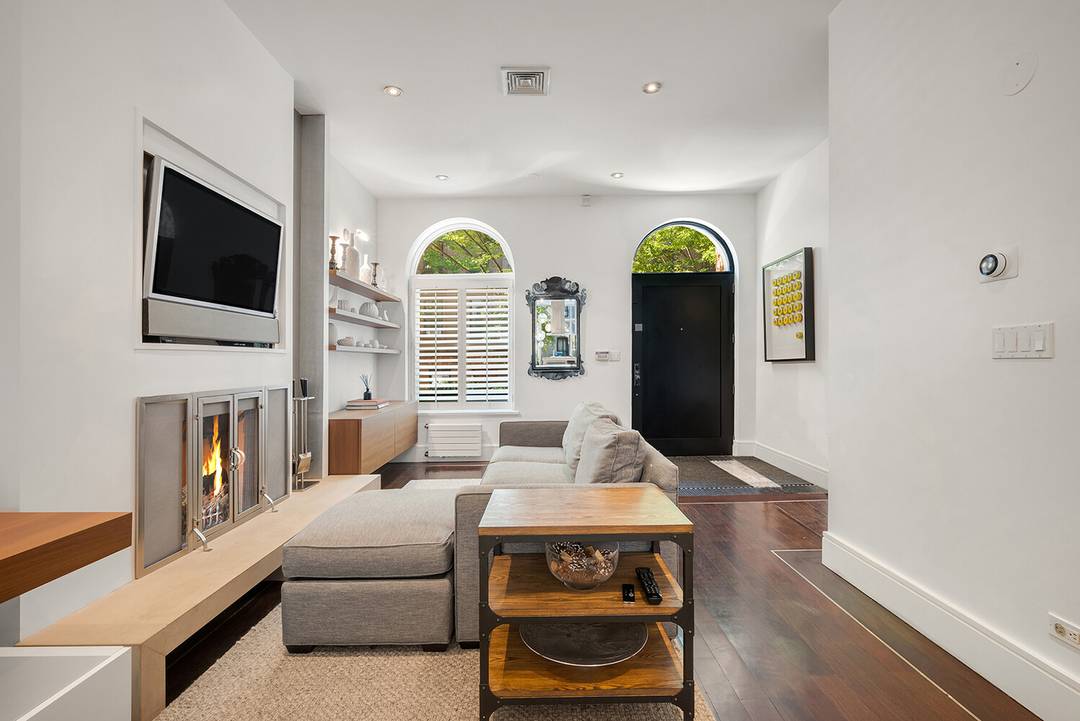 Discover a seamless blend of indoor outdoor living within the captivating design of this townhouse.