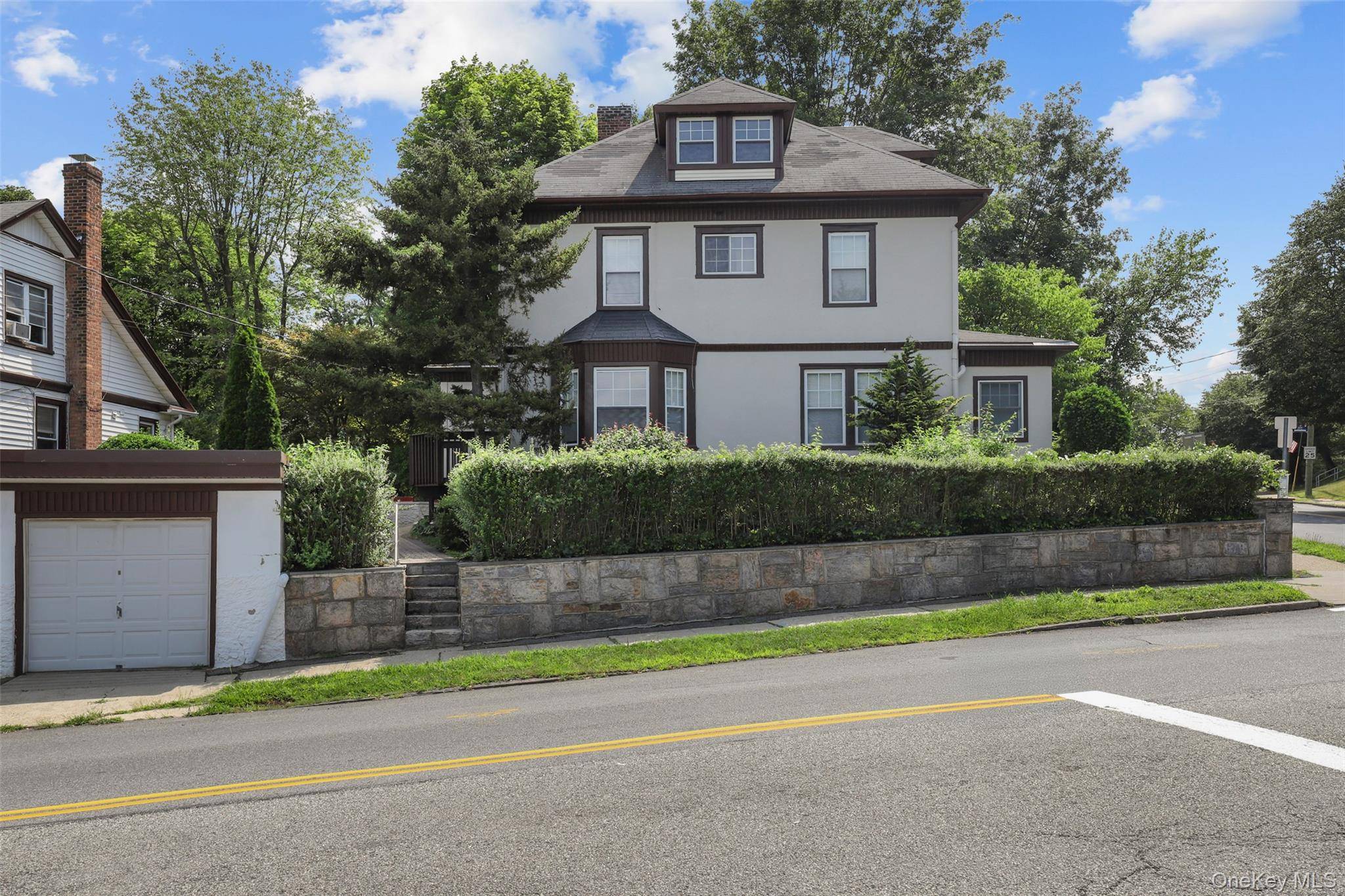 Discover the perfect blend of comfort and classic charm at 135 Ashford Ave, Dobbs Ferry, NY.