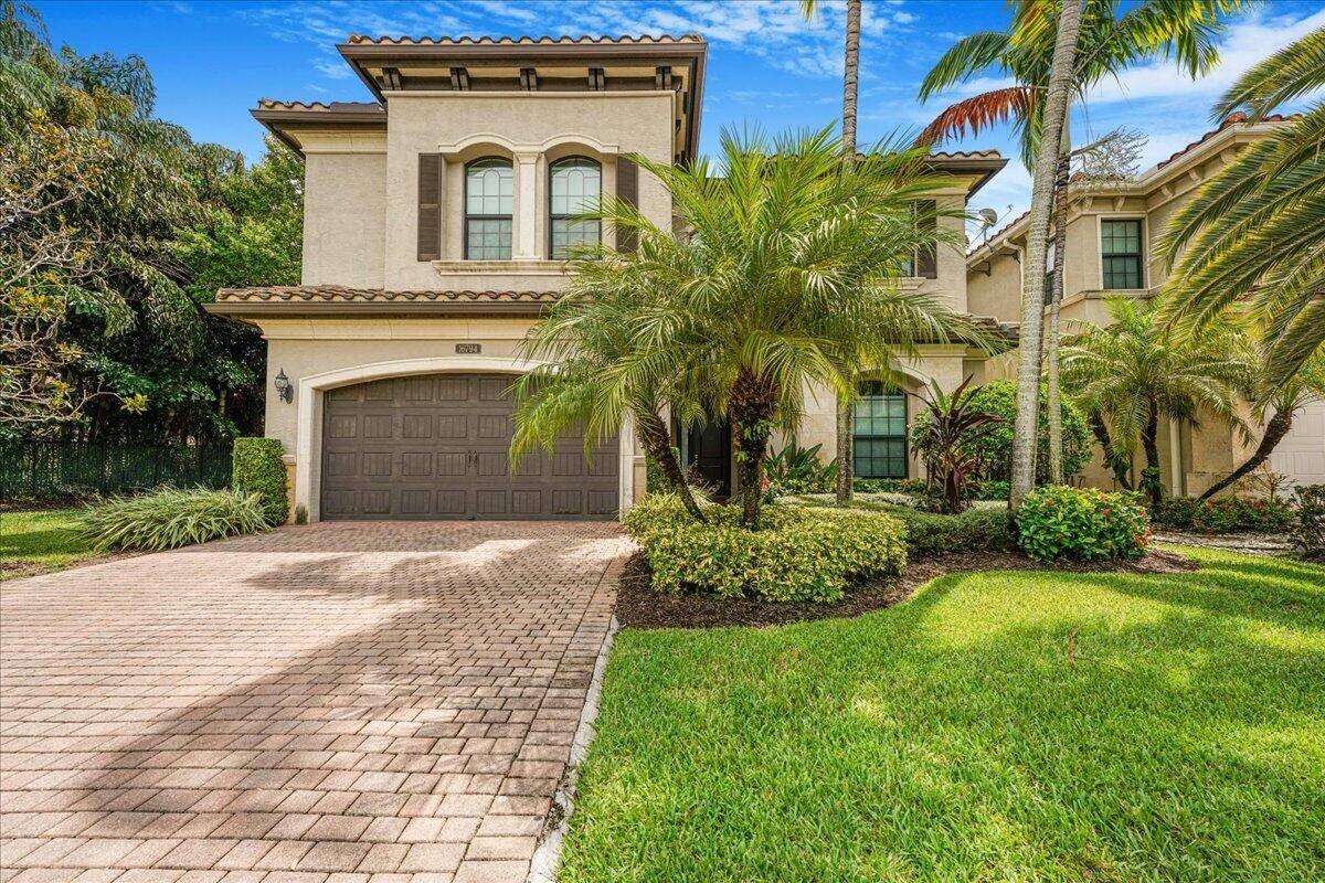 Single family home situated on a premium lake lot with additional side yard easement.