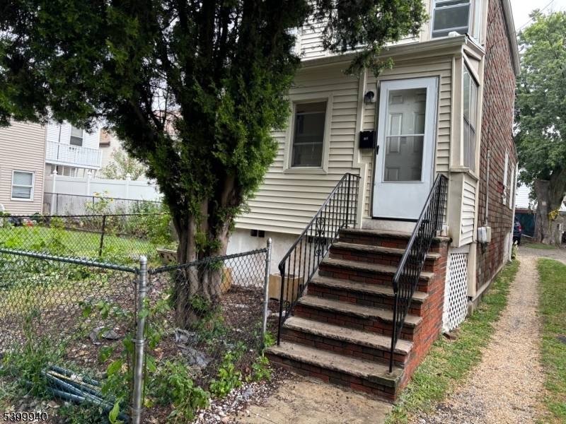 Price Improvement Welcome to this refreshed 3 bedroom, 1 bath home in the heart of Orange, NJ.