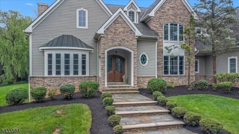 Nestled in a serene highly private setting, this exceptional custom Colonial uniquely fronts backs onto protected forest preserved Green Acres, offering rare privacy beautiful year round natural views.