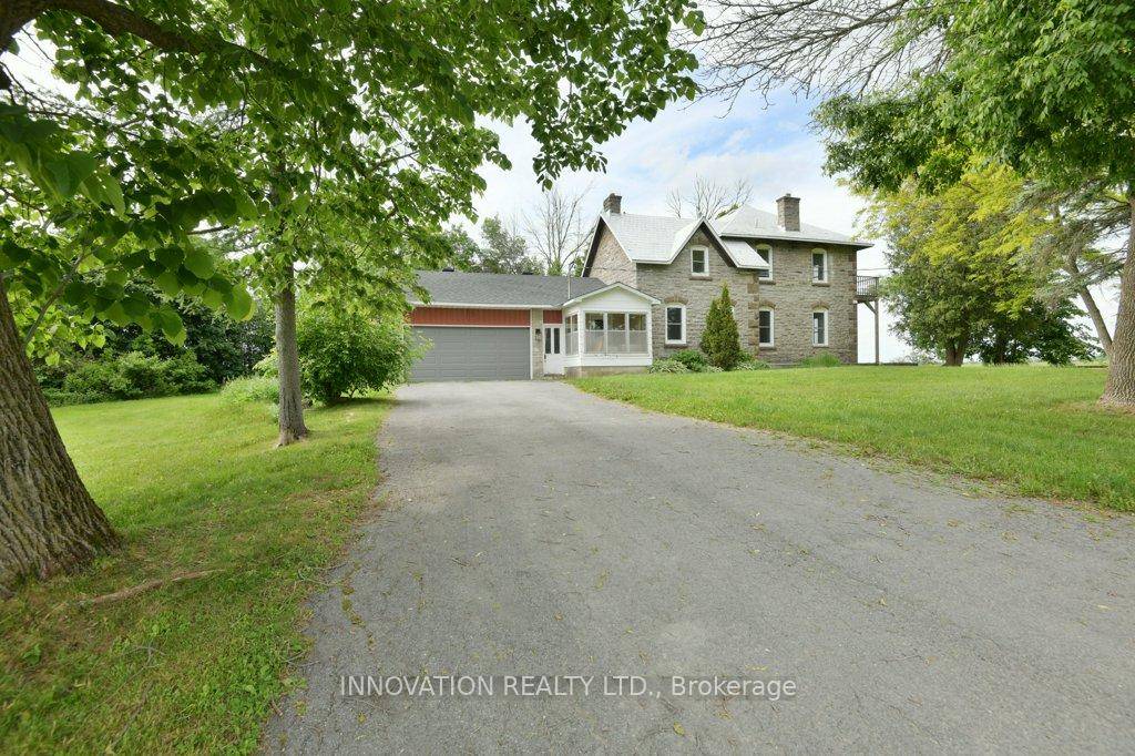 Solid Stone 2 Storey 3 bedroom, 2 bathroom home nestled upon a treed lot within the peaceful Countryside within 5 minutes to Almonte.