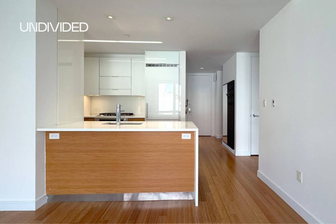 Residence 6F at 303 East 33rd Street offers approximately 874 square feet of modern, corner living with bright, north and east exposures.