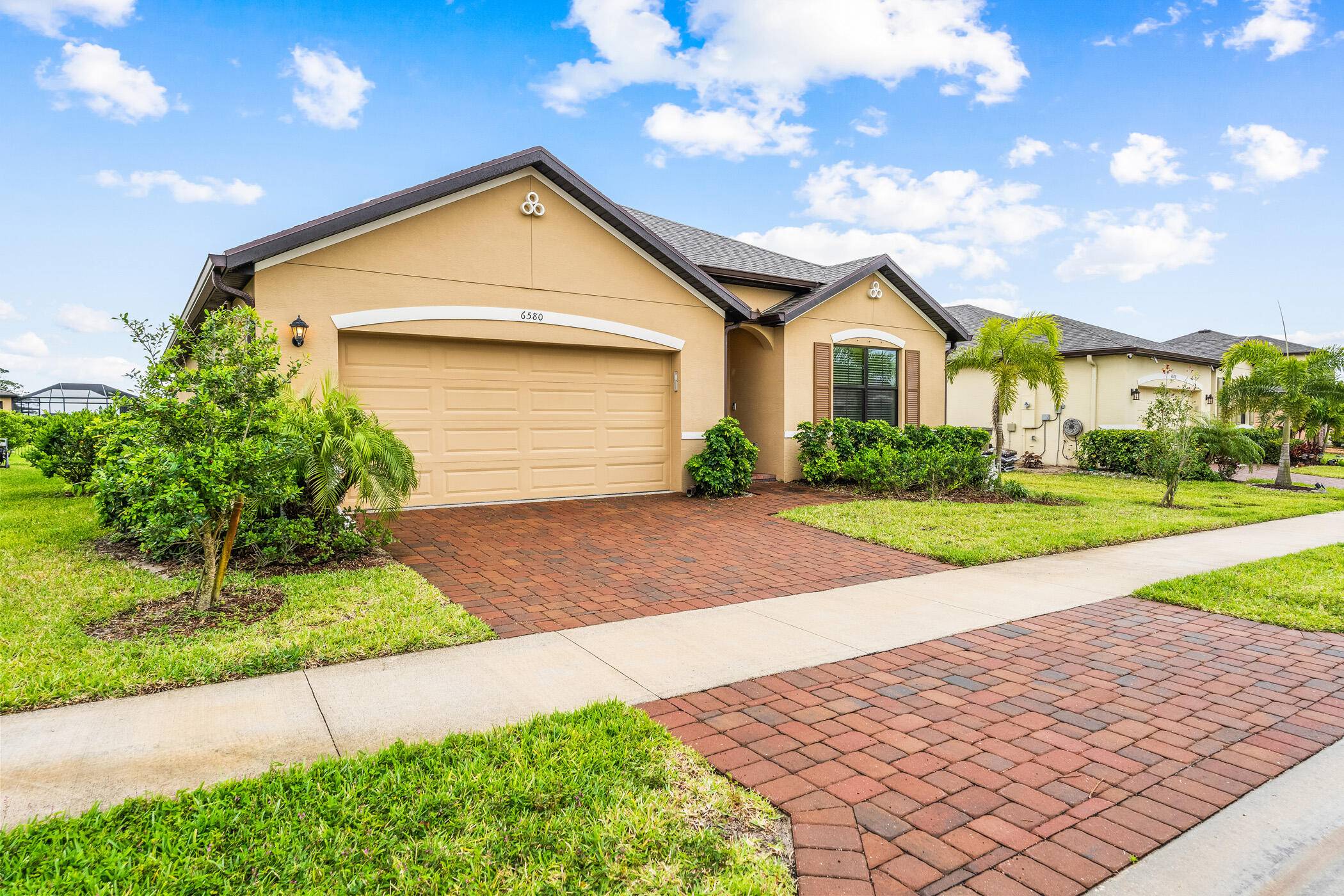 This is a 4 bedroom 2 bath home in a gated community home was built in 2022 to the latest hurricane codes.