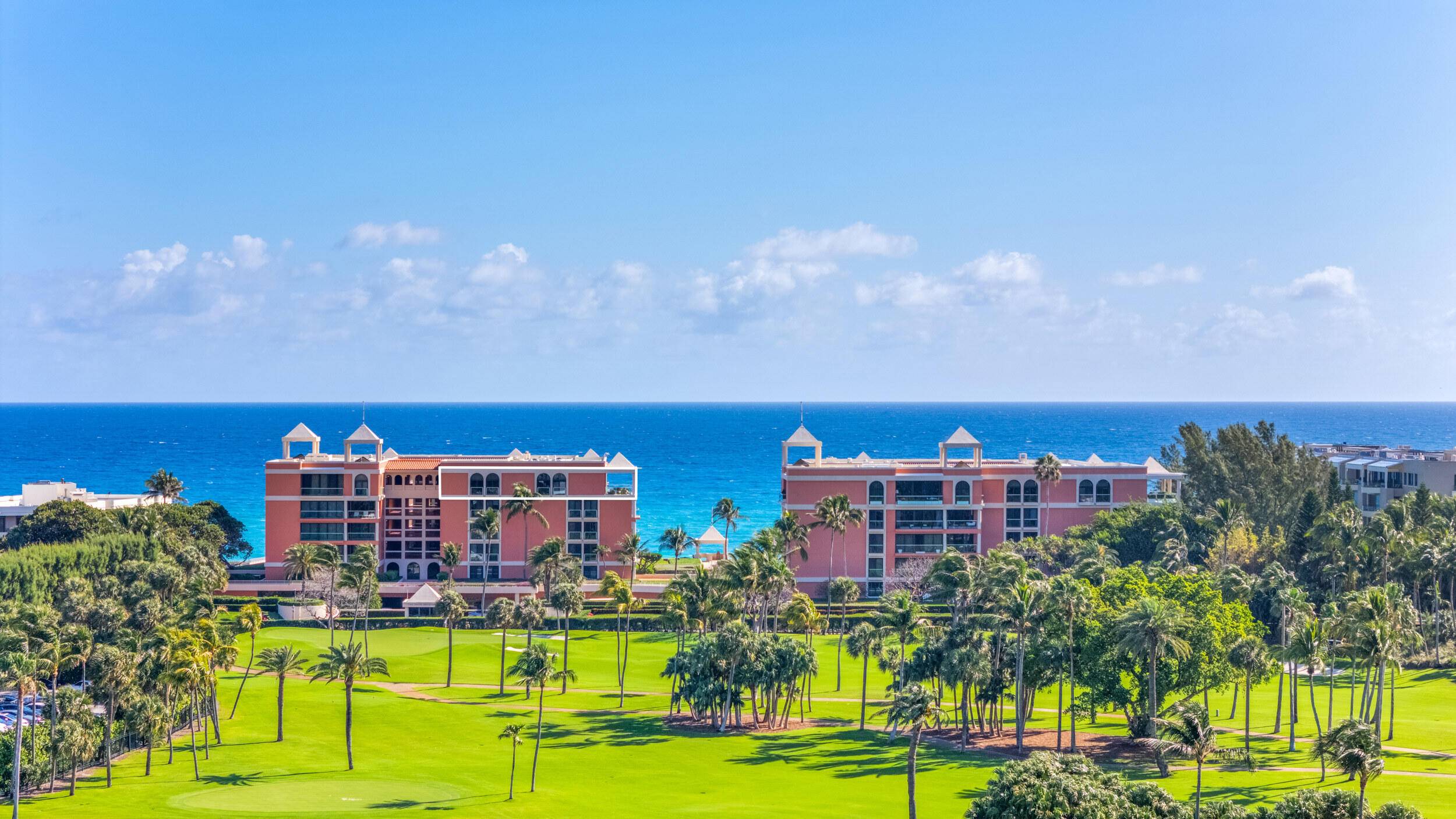 This elegant Palm Beach penthouse overlooks the city skyline, ocean, and The Breakers Hotel.