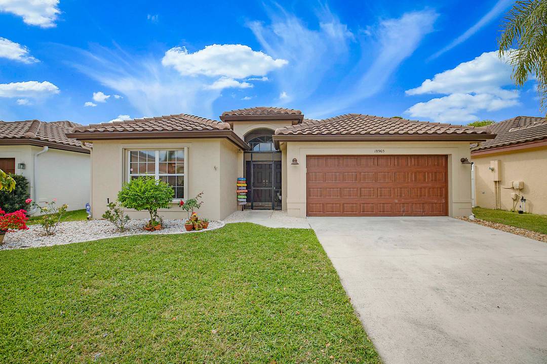 Enjoy comfort, efficiency, and privacy in this well appointed home located in the desirable The Lakes at Boca Raton.