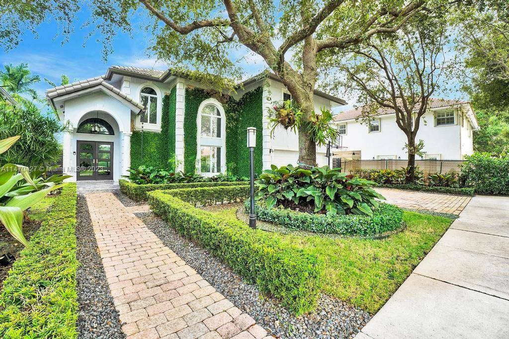 IMMACULATE TURN KEY CORNER LOT SINGLE FAMILY BUILT IN 2003 HOME IN THE DESIRABLE GATED COMMUNITY OF PINEWOOD GROVE.