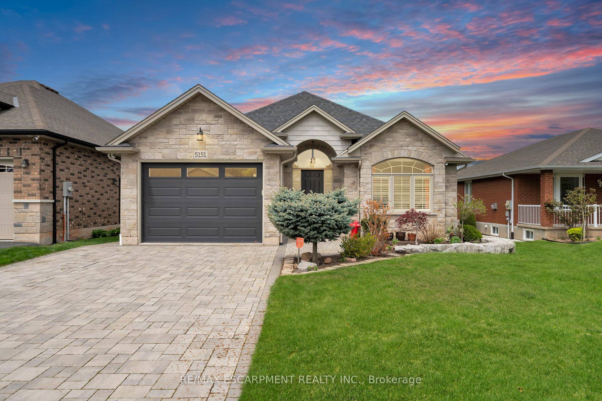 Located near the wineries in the Town of Beamsville, this one floor home features vaulted ceilings, hardwood floors, open concept layout with dark maple kitchen, granite counters, access to covered ...