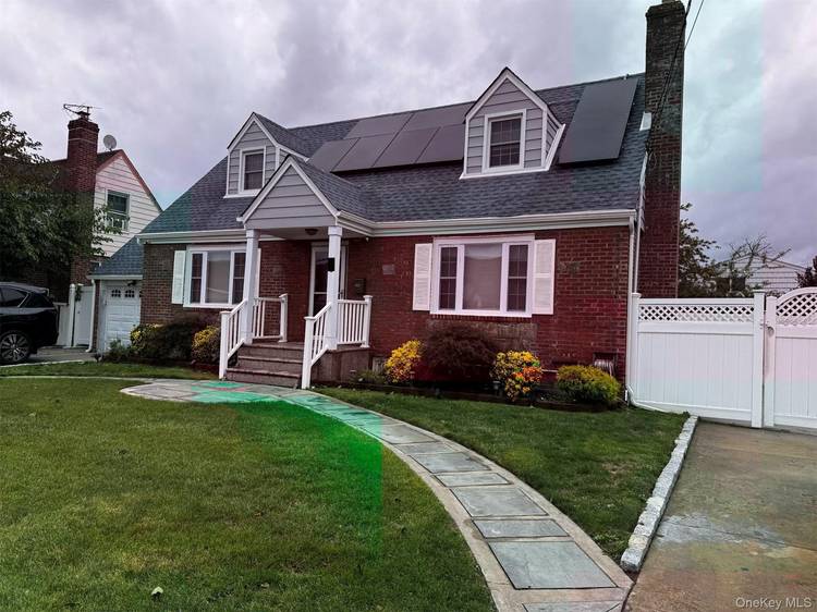 This charming home features four bedrooms, two full bathrooms, and a spacious eat in kitchen with a dining area.